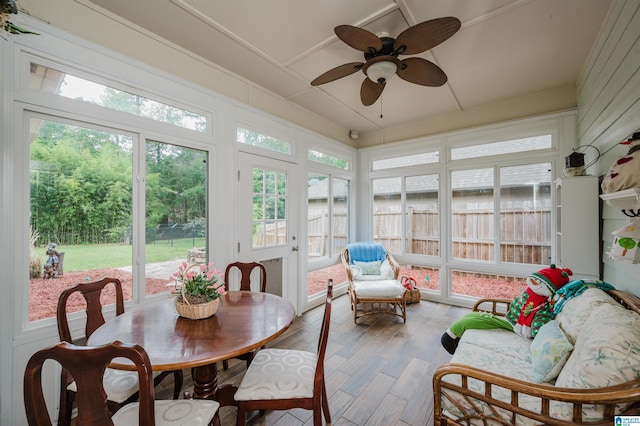 sunroom / solarium with wood finished floors