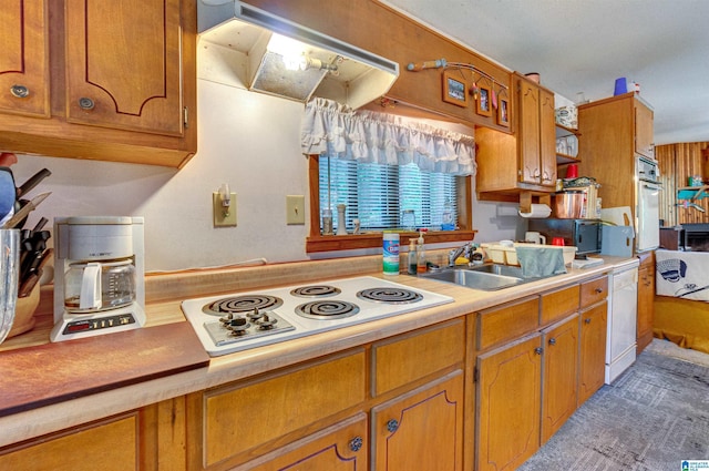 156 Wallace Dr, Shelby, AL 35143 - kitchen with white appliances, under cabinet range hood, a sink, and brown cabinets