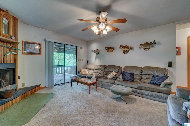 156 Wallace Dr, Shelby, AL 35143 - living room featuring carpet, ceiling fan, and a fireplace with raised hearth