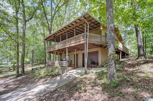 156 Wallace Dr, Shelby, AL 35143 - back of property featuring a wooden deck and a patio