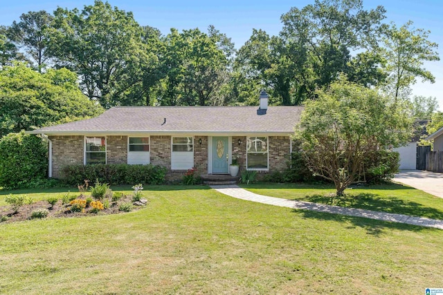3404 Strollaway Dr, Hoover, AL 35226 - ranch-style home with a chimney, a front yard, and brick siding