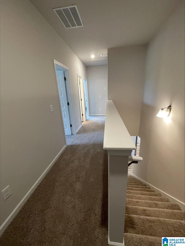 stairs featuring carpet floors, baseboards, recessed lighting, and visible vents