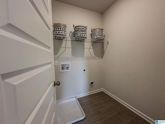 laundry area with laundry area, hookup for a washing machine, baseboards, electric dryer hookup, and wood tiled floor