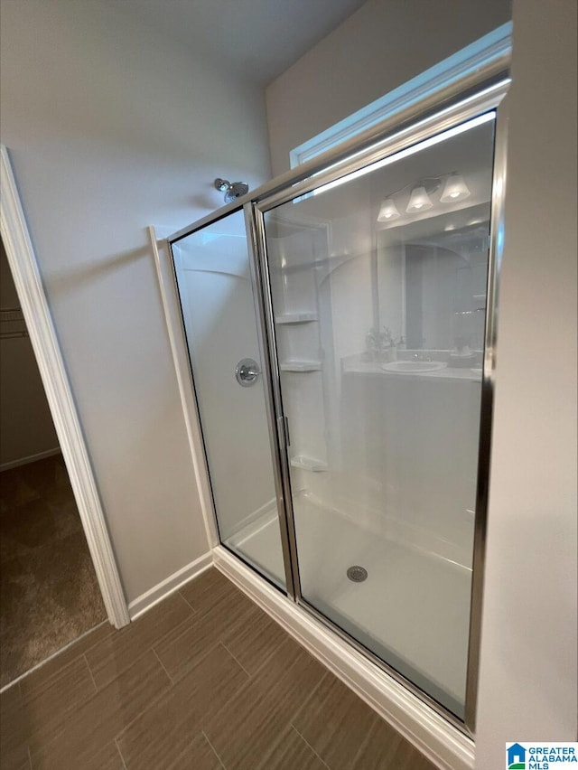 full bathroom with a stall shower