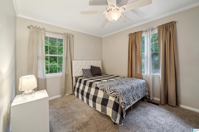 2105 NE 5th St NE, Center Point, AL 35215 - carpeted bedroom featuring a ceiling fan, baseboards, and ornamental molding