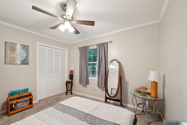 2105 NE 5th St NE, Center Point, AL 35215 - bedroom with carpet flooring, ceiling fan, baseboards, ornamental molding, and a closet