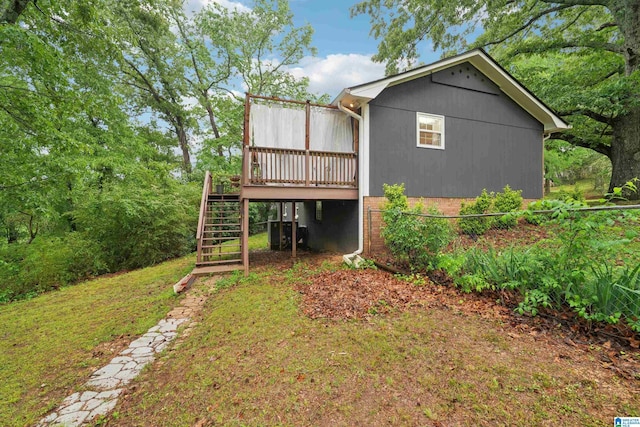 2105 NE 5th St NE, Center Point, AL 35215 - rear view of property with a wooden deck and stairway