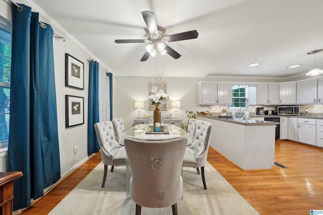 2105 NE 5th St NE, Center Point, AL 35215 - dining space featuring recessed lighting, ceiling fan, ornamental molding, and light wood-type flooring