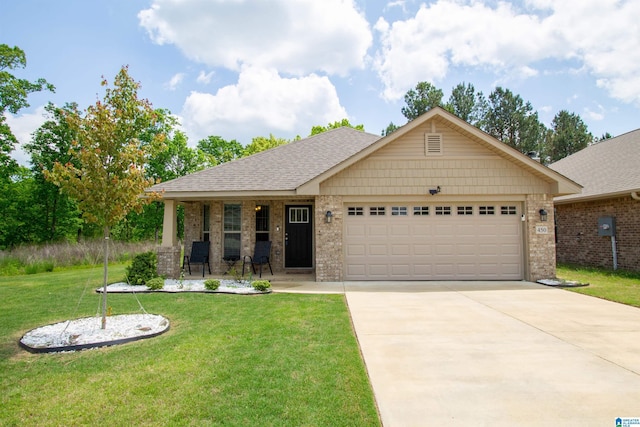 view of front of property featuring covered porch, driveway, a front yard, brick siding, and an attached garage