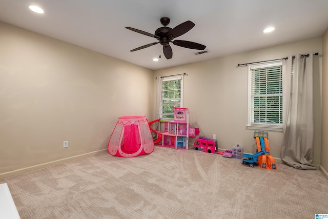 playroom featuring visible vents, carpet floors, baseboards, recessed lighting, and a ceiling fan