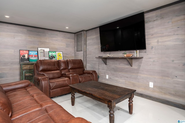 living room with wooden walls and recessed lighting