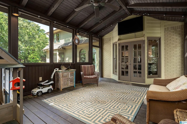 deck with french doors, fence, and ceiling fan