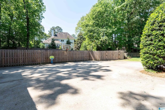 view of patio featuring fence