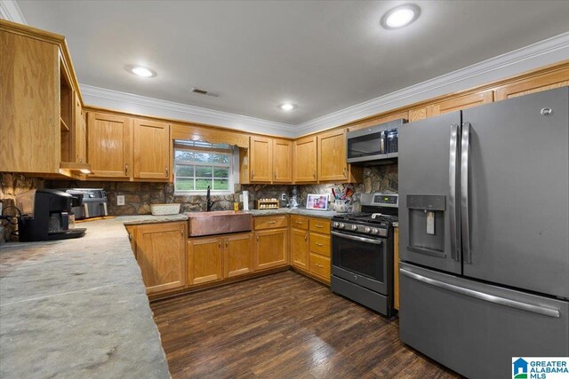 239 Gilliland Rd, Oneonta, AL 35121 - kitchen featuring a sink, stainless steel appliances, tasteful backsplash, visible vents, and ornamental molding