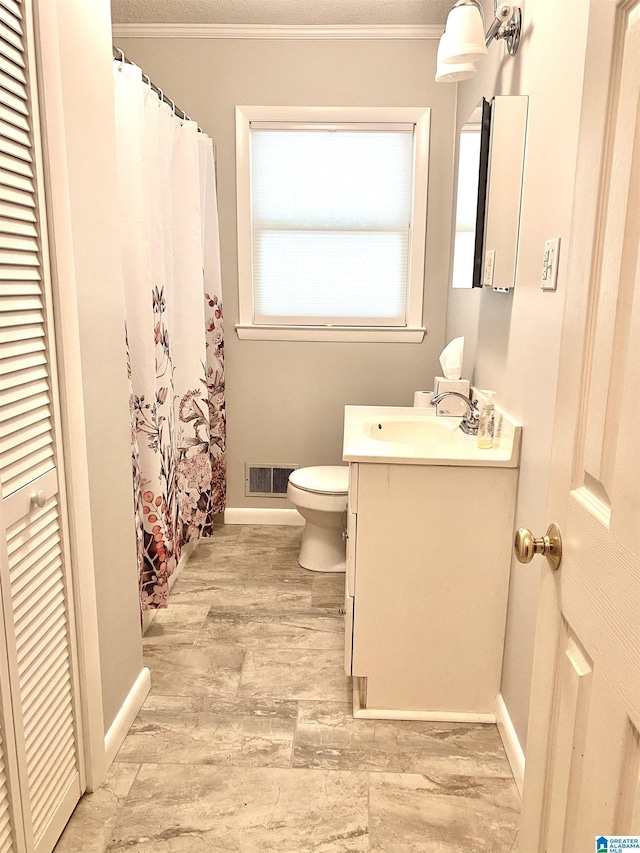 full bathroom with visible vents, ornamental molding, vanity, toilet, and baseboards