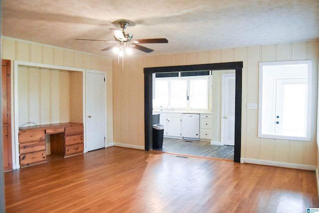 602 Riddle Ave, Piedmont, AL 36272 - unfurnished bedroom with ceiling fan, visible vents, a sink, baseboards, and light wood-style flooring