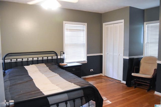 602 Riddle Ave, Piedmont, AL 36272 - bedroom featuring baseboards, wood finished floors, and a closet