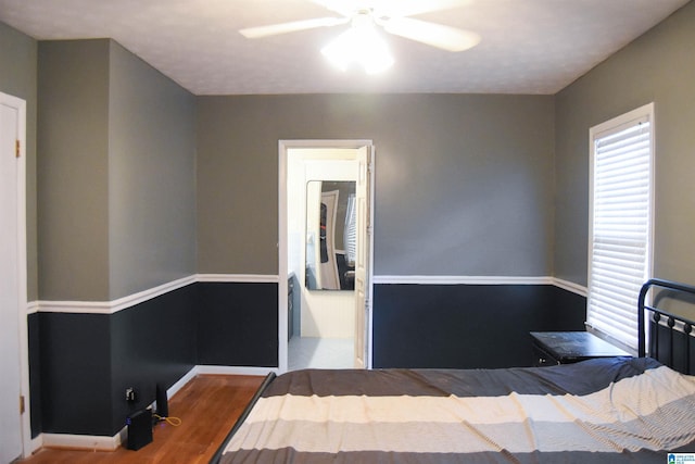 602 Riddle Ave, Piedmont, AL 36272 - bedroom with baseboards, ceiling fan, and wood finished floors