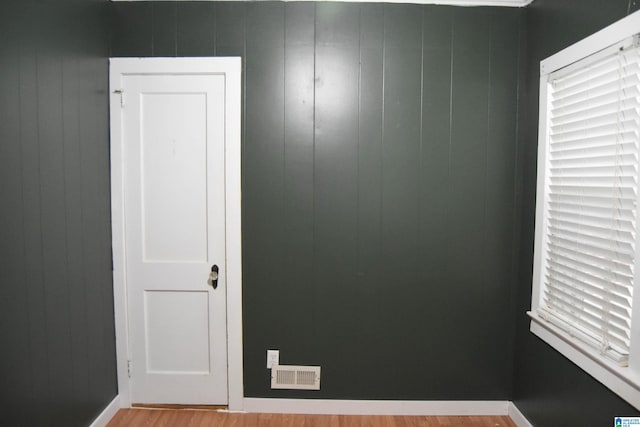 602 Riddle Ave, Piedmont, AL 36272 - spare room with baseboards, wood finished floors, and visible vents