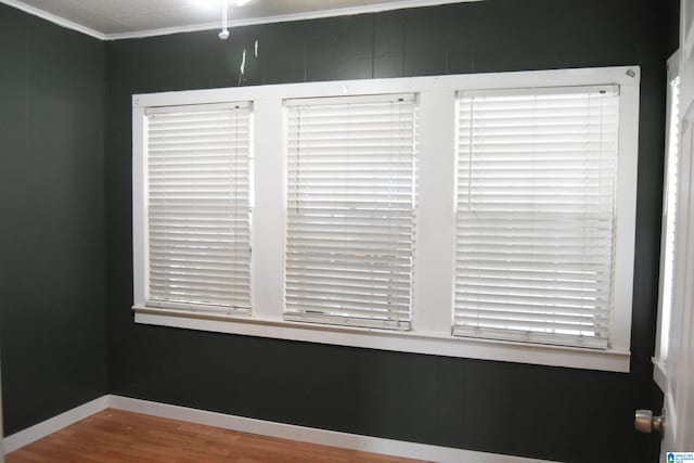 602 Riddle Ave, Piedmont, AL 36272 - room details featuring baseboards, ornamental molding, and wood finished floors
