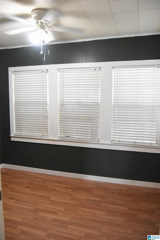 602 Riddle Ave, Piedmont, AL 36272 - unfurnished room featuring baseboards, ceiling fan, and wood finished floors