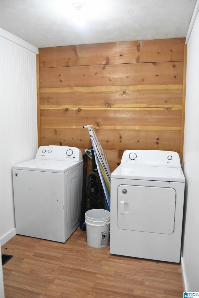 602 Riddle Ave, Piedmont, AL 36272 - laundry room with laundry area, independent washer and dryer, and light wood-type flooring