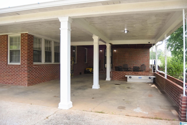 602 Riddle Ave, Piedmont, AL 36272 - view of patio / terrace featuring an attached carport