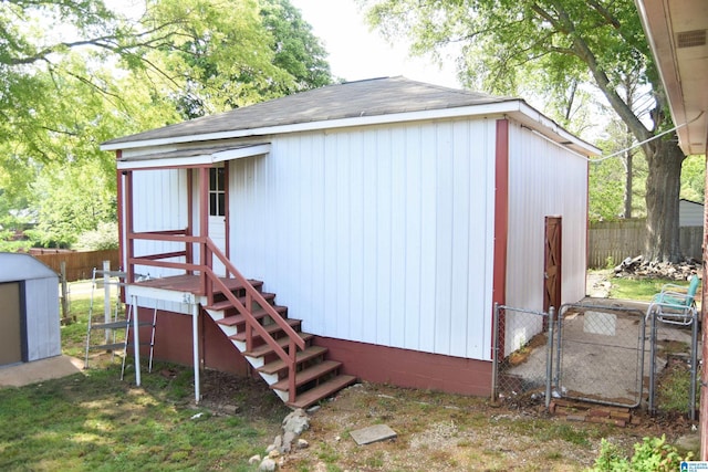 602 Riddle Ave, Piedmont, AL 36272 - view of shed with a fenced backyard and a gate