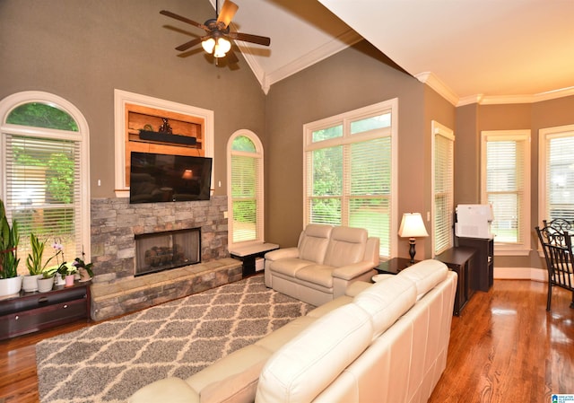 1103 Greystone Cove Dr, Hoover, AL 35242 - living room featuring crown molding, a fireplace, a ceiling fan, and wood finished floors