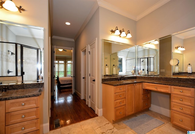 1103 Greystone Cove Dr, Hoover, AL 35242 - bathroom featuring vanity, ornamental molding, a stall shower, and ensuite bath