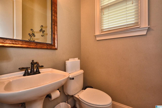 1103 Greystone Cove Dr, Hoover, AL 35242 - bathroom with baseboards, a sink, and toilet