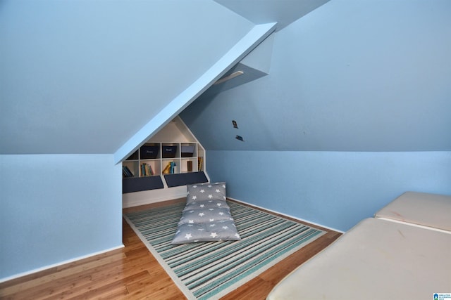 1103 Greystone Cove Dr, Hoover, AL 35242 - bedroom featuring baseboards, vaulted ceiling, and wood finished floors