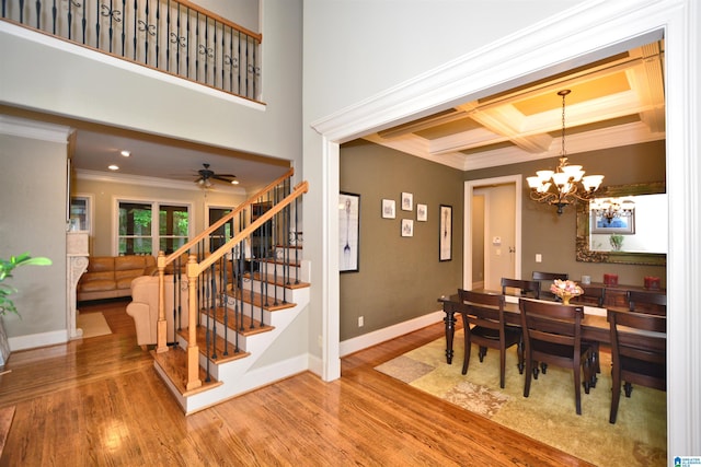 1103 Greystone Cove Dr, Hoover, AL 35242 - dining room featuring crown molding, beam ceiling, baseboards, wood finished floors, and stairway