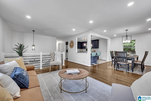 917 Forrest Dr S, Homewood, AL 35209 - living room featuring baseboards, recessed lighting, wood finished floors, and a chandelier