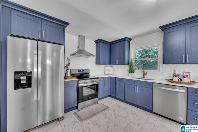 917 Forrest Dr S, Homewood, AL 35209 - kitchen featuring a sink, blue cabinetry, wall chimney exhaust hood, marble finish floor, and stainless steel appliances