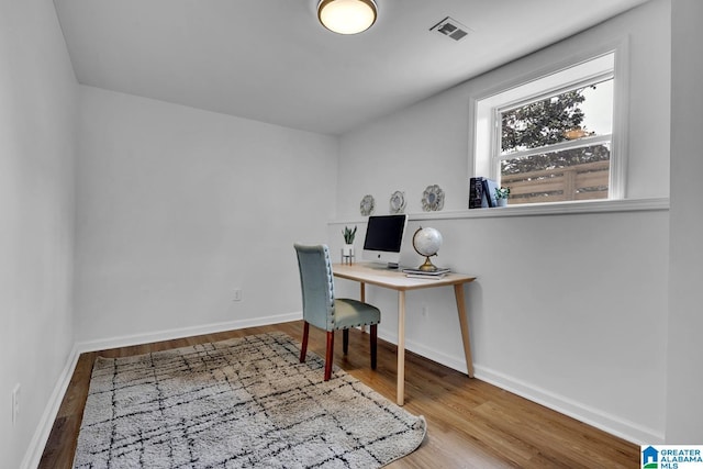 917 Forrest Dr S, Homewood, AL 35209 - home office featuring visible vents, baseboards, and wood finished floors
