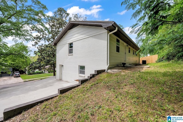 917 Forrest Dr S, Homewood, AL 35209 - view of property exterior featuring brick siding and fence