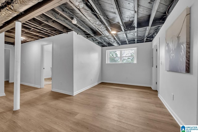 917 Forrest Dr S, Homewood, AL 35209 - basement featuring light wood-type flooring and baseboards