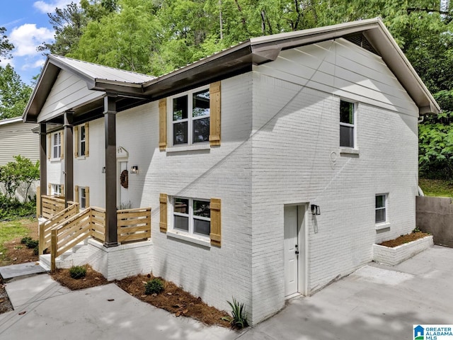 917 Forrest Dr S, Homewood, AL 35209 - view of front of property featuring brick siding and a patio
