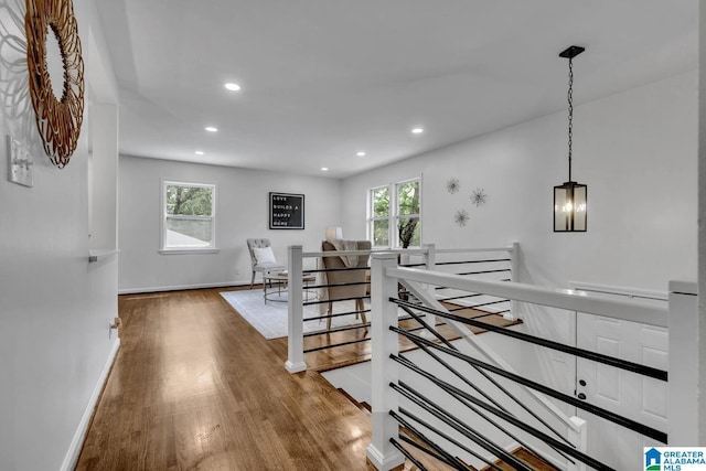 917 Forrest Dr S, Homewood, AL 35209 - hall featuring baseboards, recessed lighting, wood finished floors, and an upstairs landing