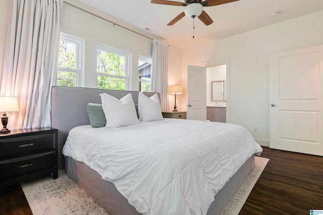 530 10th Ave S, Birmingham, AL 35205 - bedroom with visible vents, wood finished floors, baseboards, ensuite bathroom, and a ceiling fan