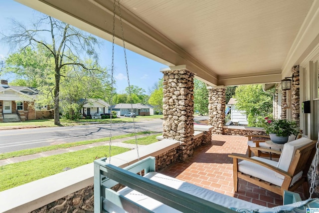 530 10th Ave S, Birmingham, AL 35205 - view of patio with a residential view and a porch