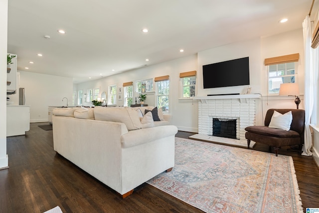 530 10th Ave S, Birmingham, AL 35205 - living area with a brick fireplace, recessed lighting, and dark wood-type flooring