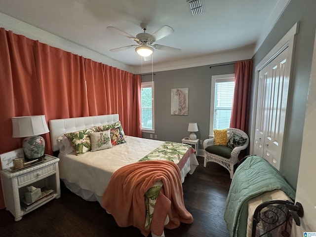 475 River Forest Ln Unit 1250, Talladega, AL 35160 - bedroom with ceiling fan, visible vents, multiple windows, and dark wood-type flooring