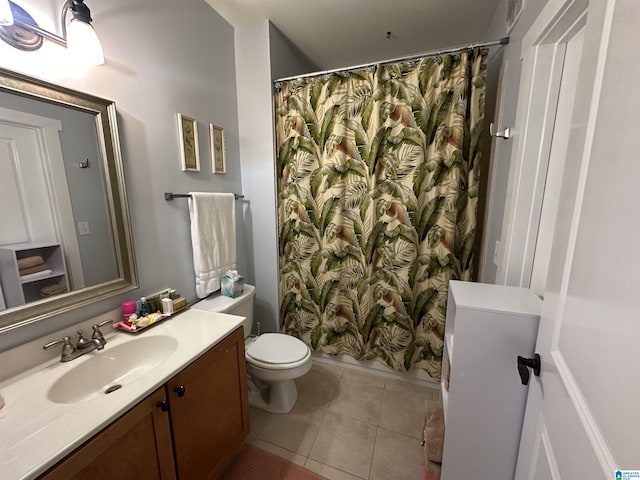 475 River Forest Ln Unit 1250, Talladega, AL 35160 - bathroom featuring vanity, tile patterned flooring, toilet, and a shower with curtain
