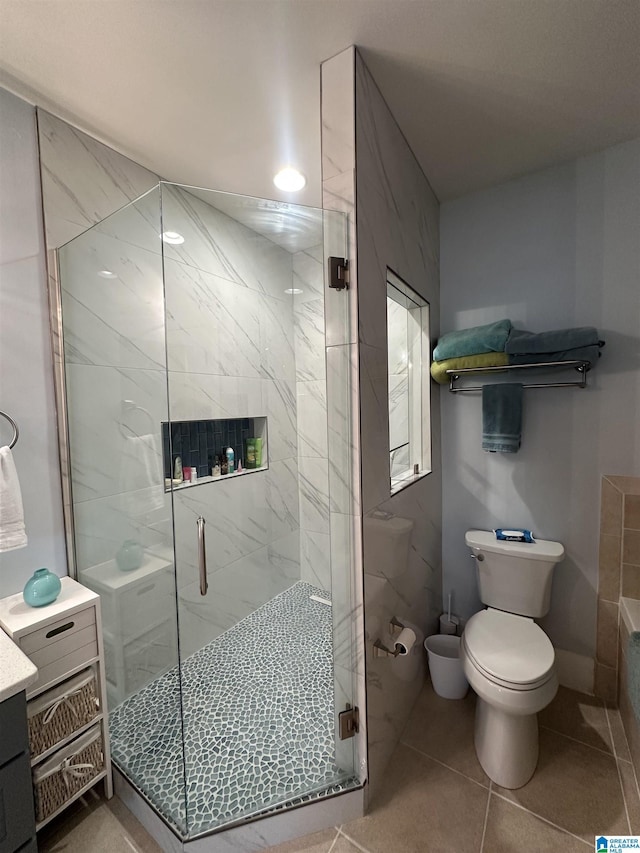 475 River Forest Ln Unit 1250, Talladega, AL 35160 - full bath featuring tile patterned flooring, a stall shower, and toilet