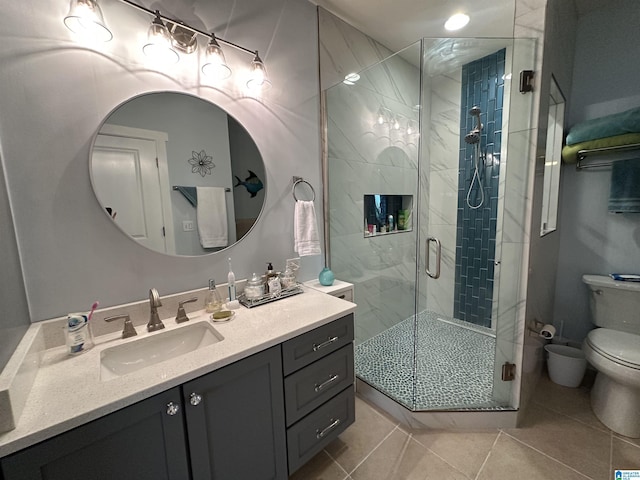 475 River Forest Ln Unit 1250, Talladega, AL 35160 - full bathroom featuring vanity, tile patterned floors, toilet, and a shower stall