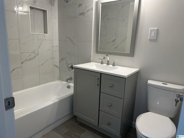full bath featuring toilet, tub / shower combination, and vanity