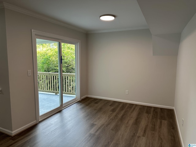 interior space featuring baseboards, ornamental molding, and dark wood finished floors