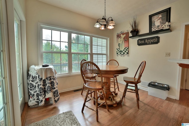 50 County Road 4311, Wedowee, AL 36278 - dining room featuring baseboards, an inviting chandelier, wood finished floors, and visible vents